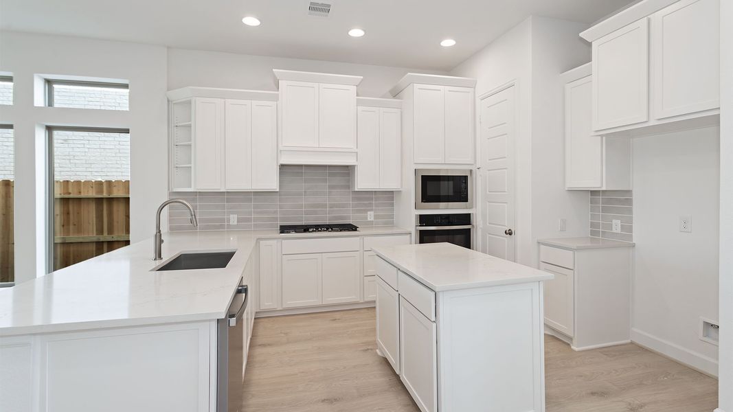 Furnished interior view inside a new home in Lakes of Cane Island, Katy (Image 6).