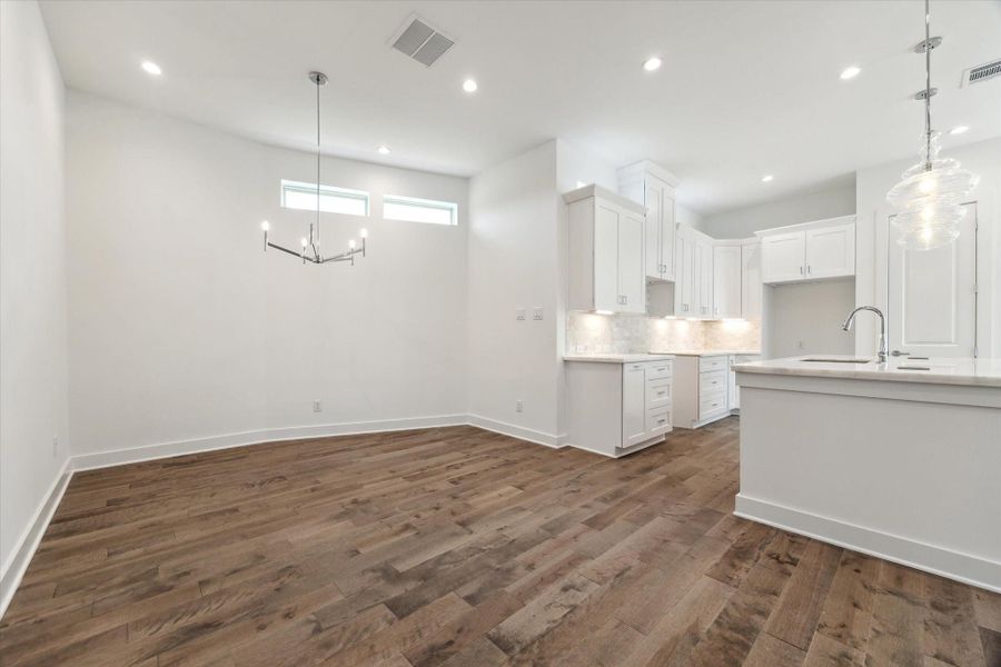 Dining Room * Designer Chandelier * Transom Window. Dining Room * Designer Chandelier * Transom Window.