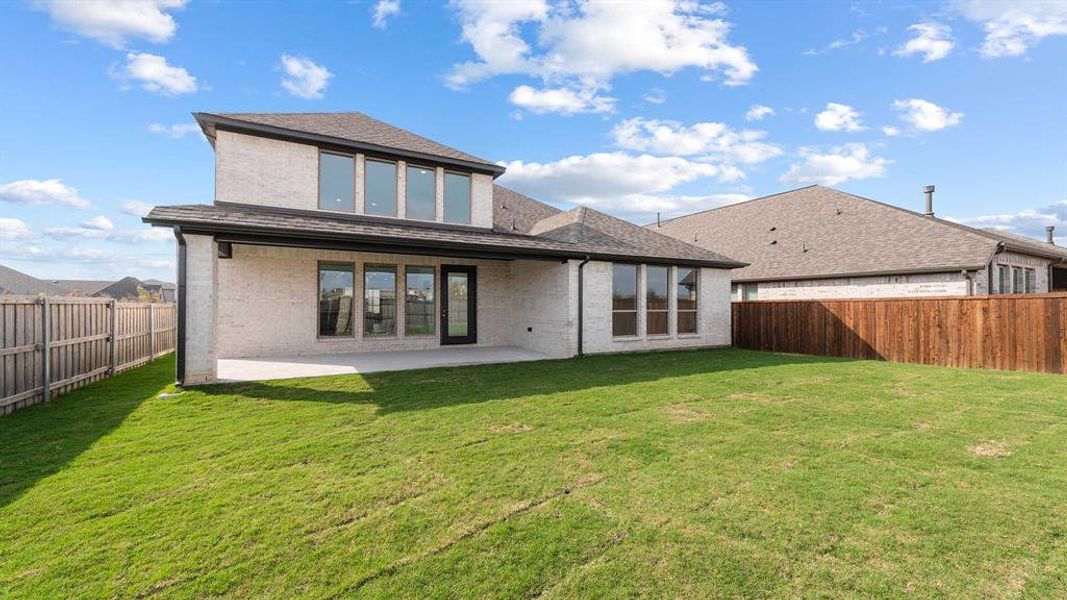 Exterior details and patio area of a home in Devonshire - Reserve 50', Forney (Image 2). Exterior details and patio area of a home in Devonshire - Reserve 50', Forney (Image 2).