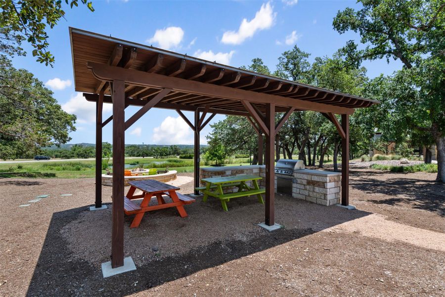View of home's community with a patio