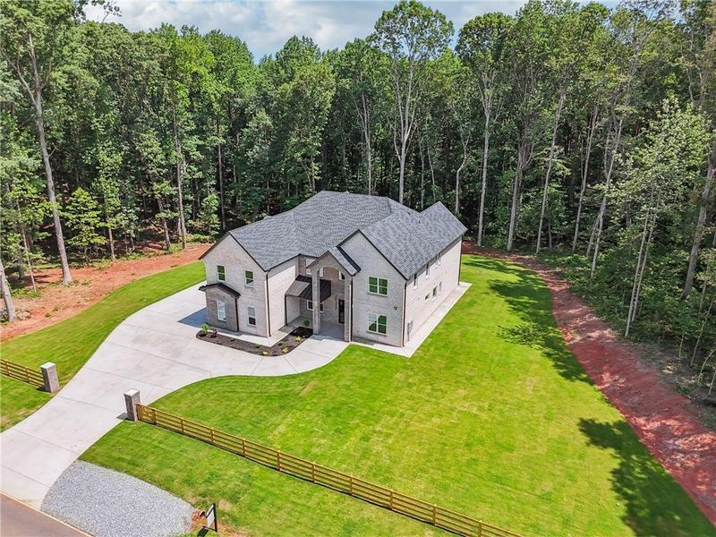 Front exterior of a new home in , Commerce, GA, highlighting curb appeal (Image 2).