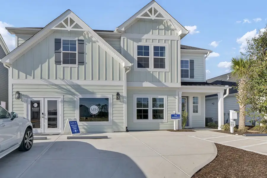 Front exterior of a new home in , Summerville, SC, highlighting curb appeal (Image 20).