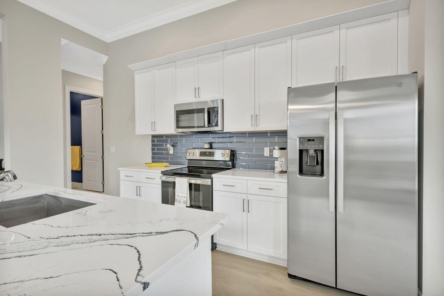 Furnished interior view inside a new home in , Port St. Lucie (Image 10).