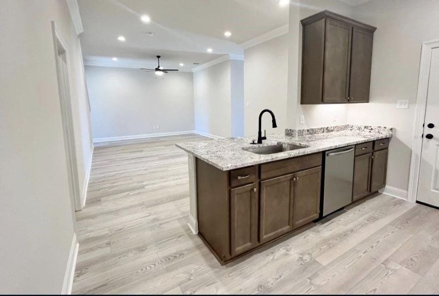 Furnished interior view inside a new home in Orange Gardens, Orange (Image 8).
