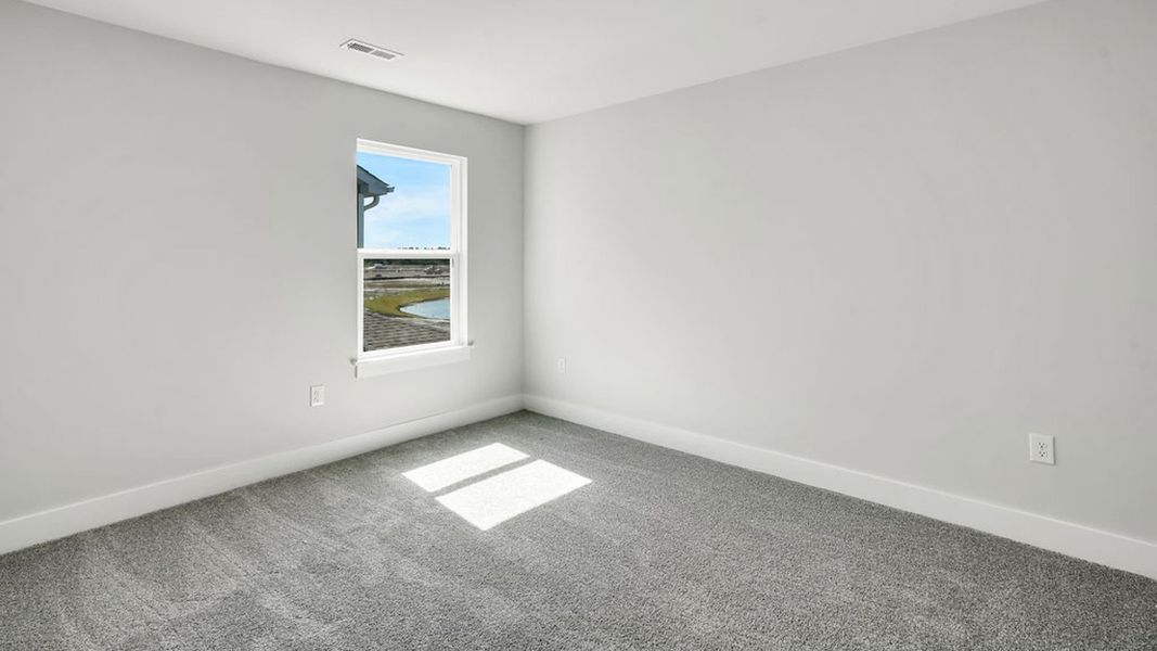 Spacious, unfurnished interior of a new home in Cedar Hill Landing, Navassa (Image 33). Spacious, unfurnished interior of a new home in Cedar Hill Landing, Navassa (Image 33).