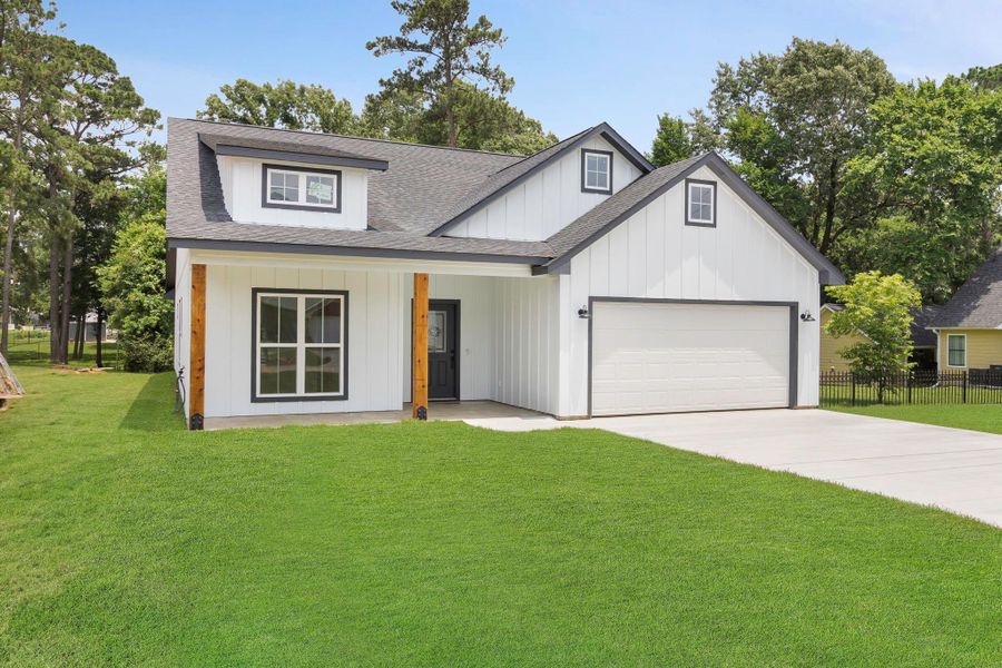 Front exterior of a new home in , Onalaska, TX, highlighting curb appeal (Image 2).