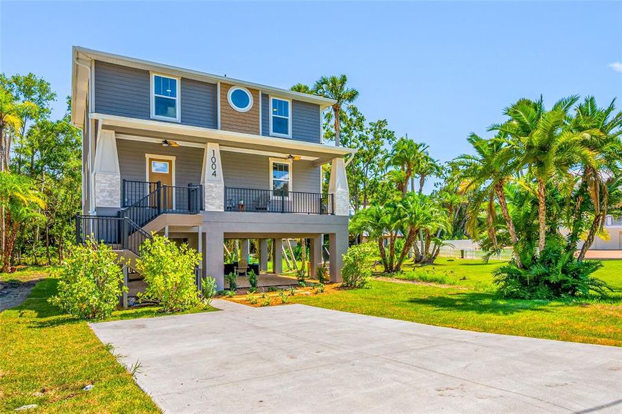 Front exterior of a new home in , Tampa, FL, highlighting curb appeal (Image 2). Front exterior of a new home in , Tampa, FL, highlighting curb appeal (Image 2).
