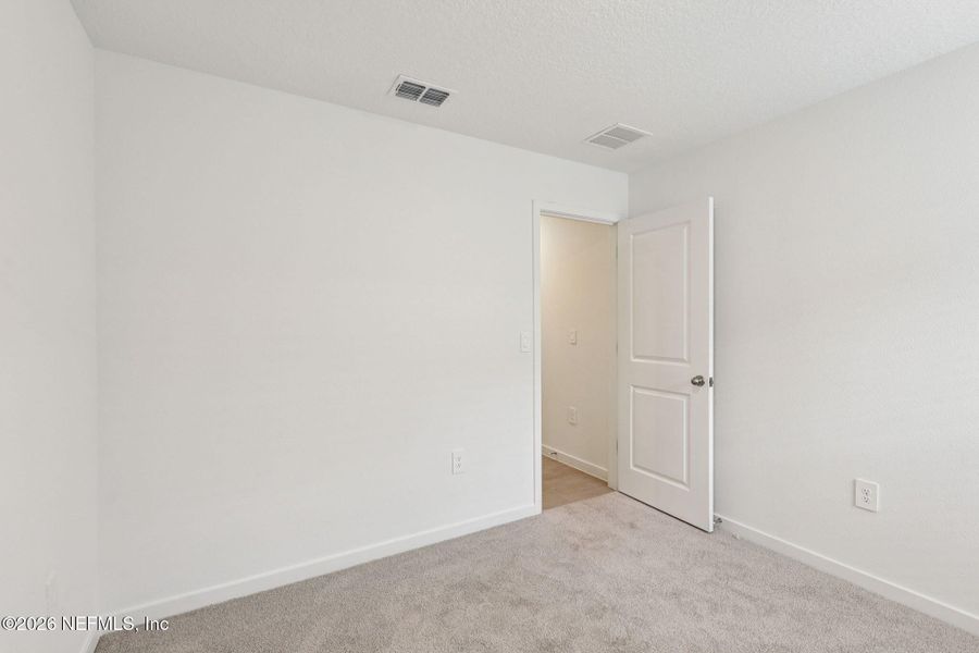 Spacious, unfurnished interior of a new home in Cypress Meadows - Signature Series, Jacksonville (Image 29).