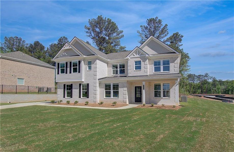 Front exterior of a new home in Trinity Park, McDonough, GA, highlighting curb appeal (Image 20).