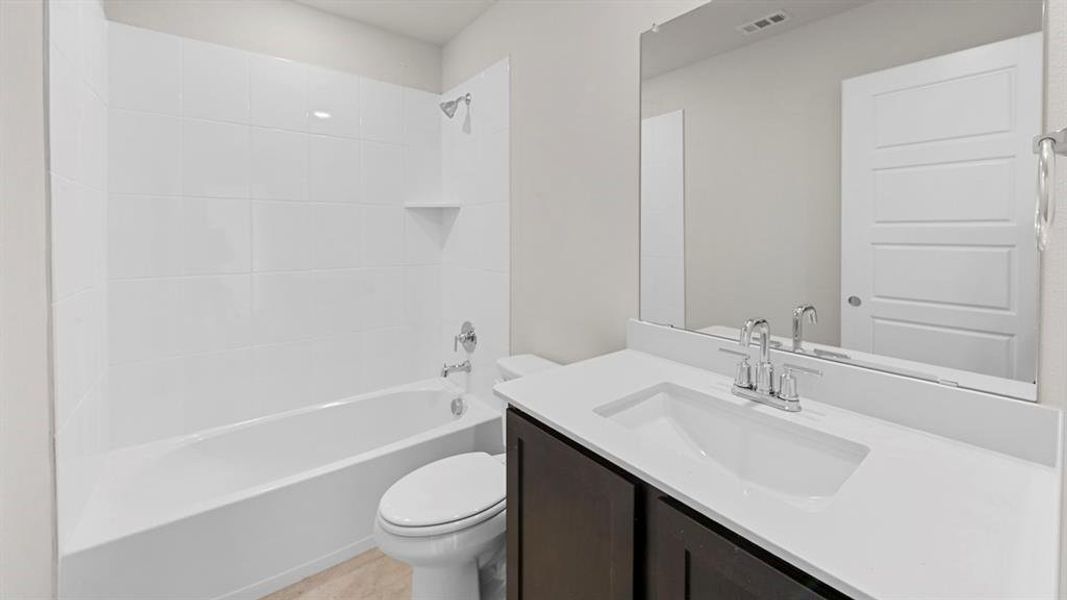 Double vanity with undermount sinks and chrome fixtures Double vanity with undermount sinks and chrome fixtures