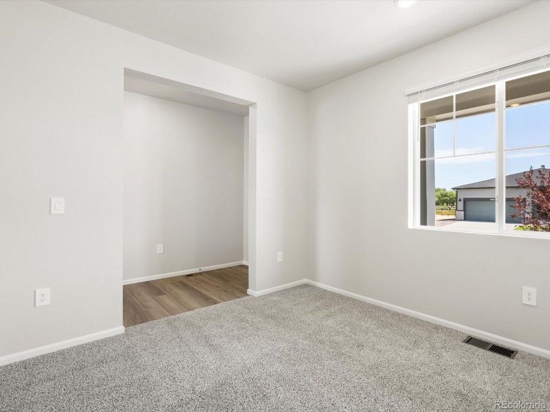 Spacious, unfurnished interior of a new home in Poudre Heights: The Alpine Collection, Windsor (Image 18).
