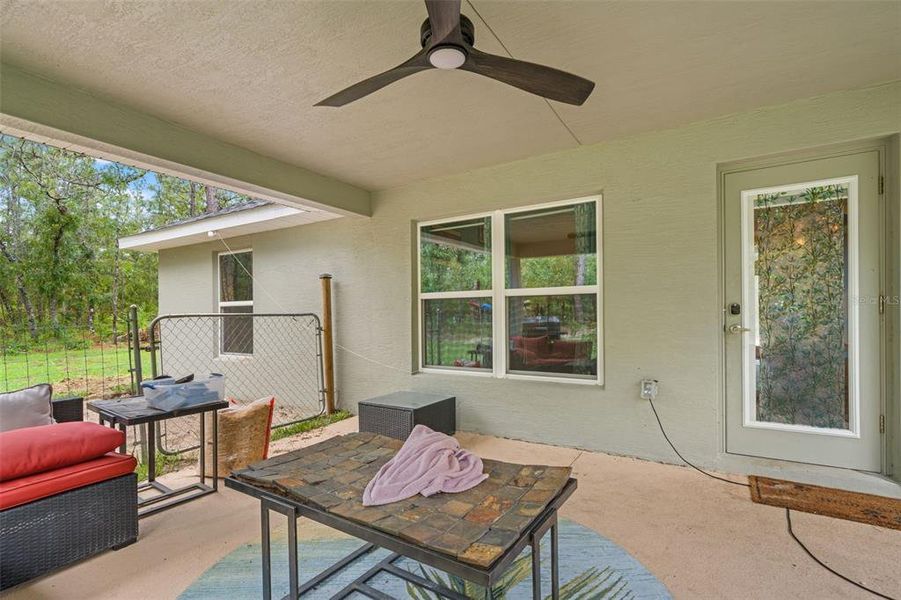 Exterior details and patio area of a home in Royal Highlands, Brooksville (Image 22).