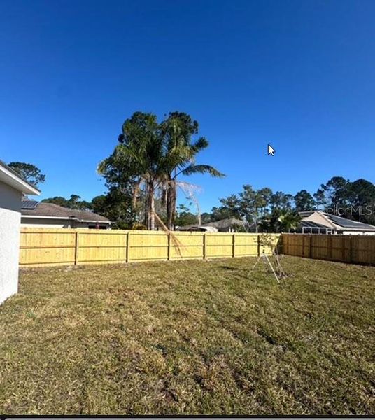 Exterior details and patio area of a home in Palm Coast: Value Collection, Palm Coast (Image 3). Exterior details and patio area of a home in Palm Coast: Value Collection, Palm Coast (Image 3).