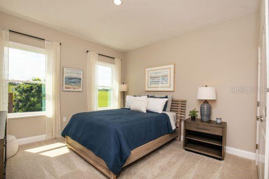 Furnished interior view inside a new home in Heritage Station, Punta Gorda (Image 24).