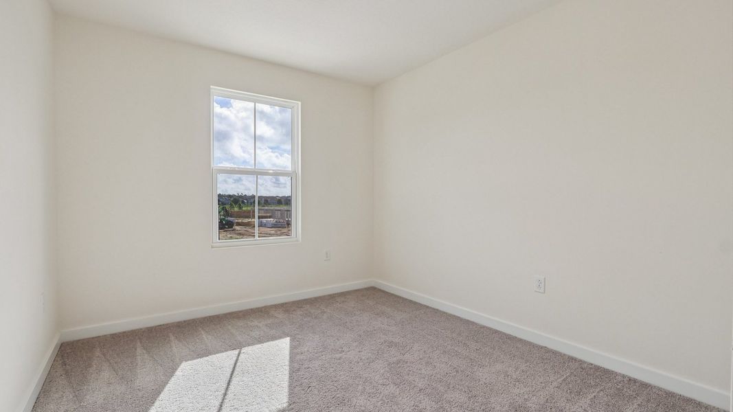 Furnished interior view inside a new home in Cyrene at Harmony, St. Cloud (Image 39).