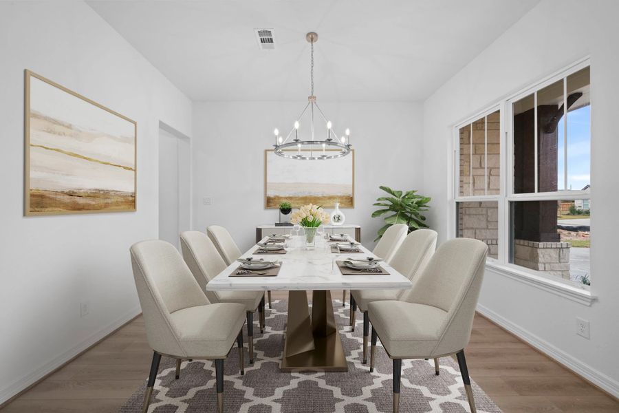 Formal dining room. Note: Sample product photo - actual exterior and interior selections may vary by homesite