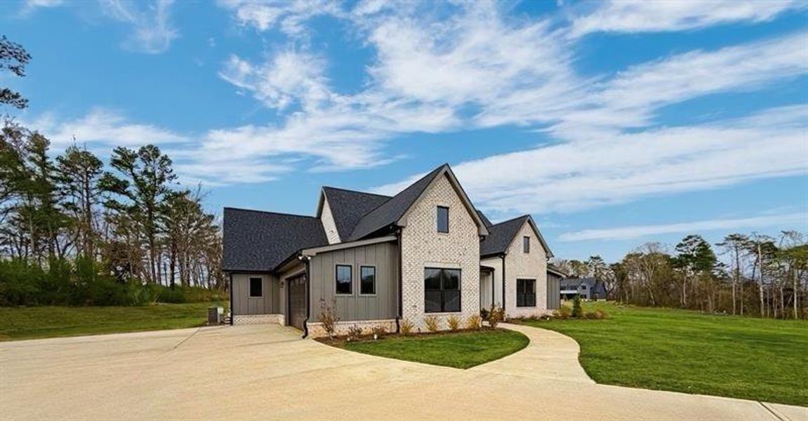 Front exterior of a new home in , Rydal, GA, highlighting curb appeal (Image 27). Front exterior of a new home in , Rydal, GA, highlighting curb appeal (Image 27).