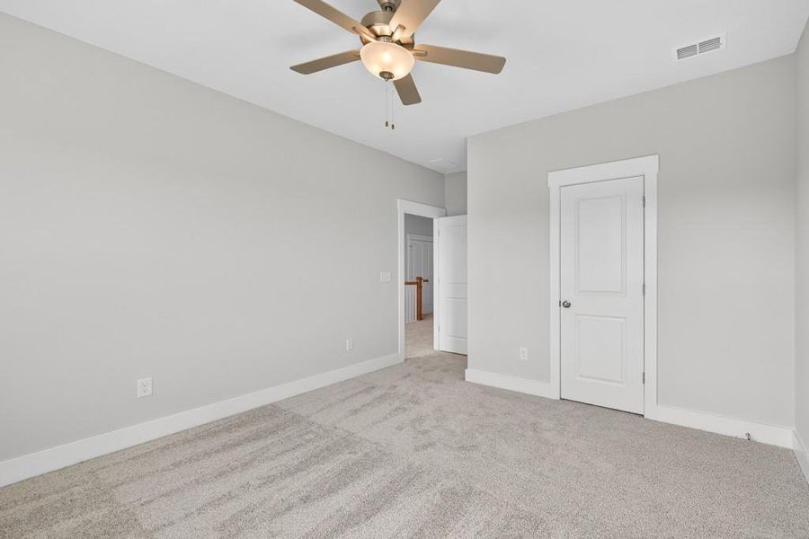 Spacious, unfurnished interior of a new home in Traditions of Braselton, Hoschton (Image 21).