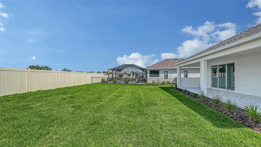 Exterior details and patio area of a home in Canoe Creek, Parrish (Image 23).