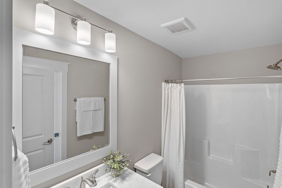 Furnished interior view inside a new home in Osprey Landing, Southport (Image 36).