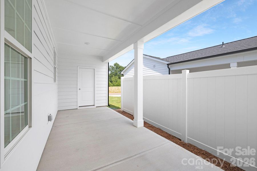 Exterior details and patio area of a home in Edgewood Preserve, Huntersville (Image 4).