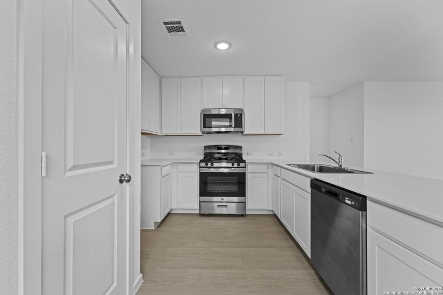 Furnished interior view inside a new home in , New Braunfels (Image 5).