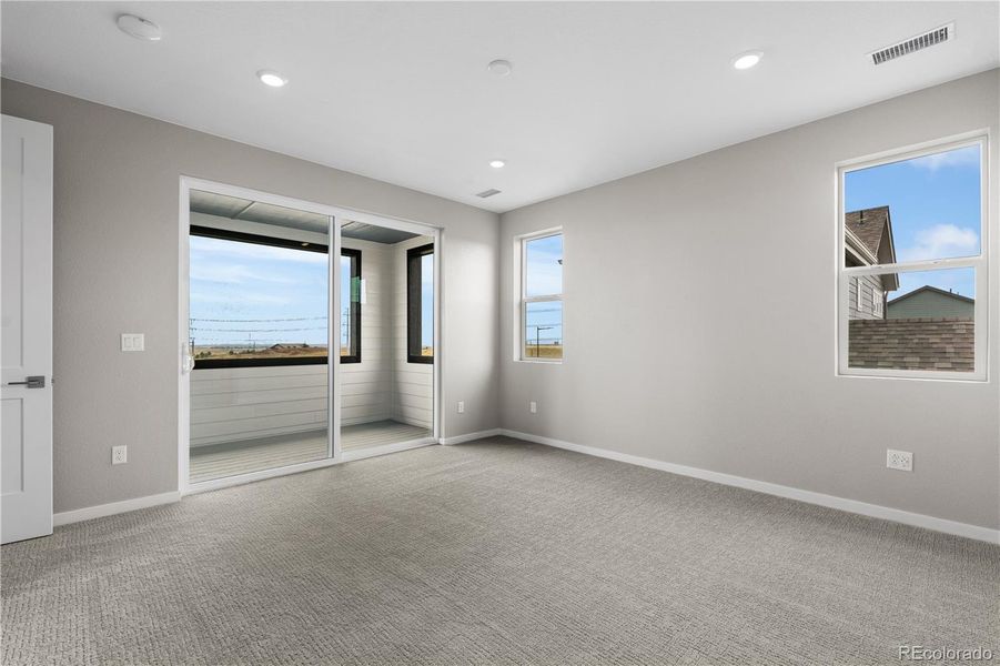 Spacious, unfurnished interior of a new home in Tribute at Lyric, Lone Tree (Image 24).