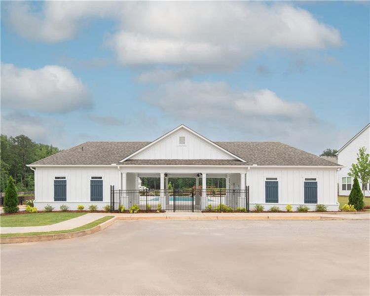 Front exterior of a new home in Shoals Crossing, Conyers, GA, highlighting curb appeal (Image 2). Front exterior of a new home in Shoals Crossing, Conyers, GA, highlighting curb appeal (Image 2).