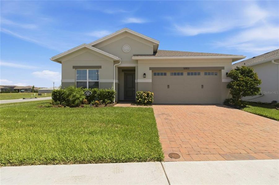 Front exterior of a new home in , St. Cloud, FL, highlighting curb appeal (Image 2). Front exterior of a new home in , St. Cloud, FL, highlighting curb appeal (Image 2).