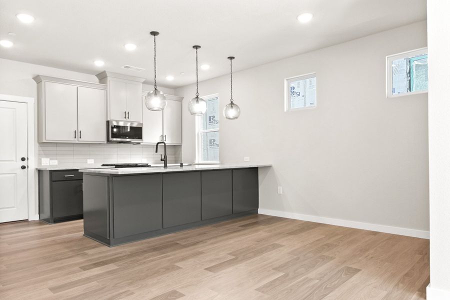 Furnished interior view inside a new home in Willow Grove Townhomes, Melissa (Image 4). Furnished interior view inside a new home in Willow Grove Townhomes, Melissa (Image 4).