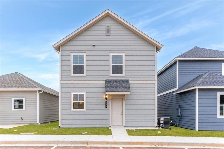 Front exterior of a new home in , Fayetteville, GA, highlighting curb appeal (Image 17).
