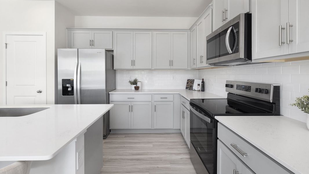 Representative furnished interior of a home built from the Freeport by D.R. Horton in Stanton, Richburg (Image 5).