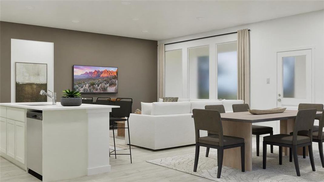 Dining area with light wood finished floors Dining area with light wood finished floors