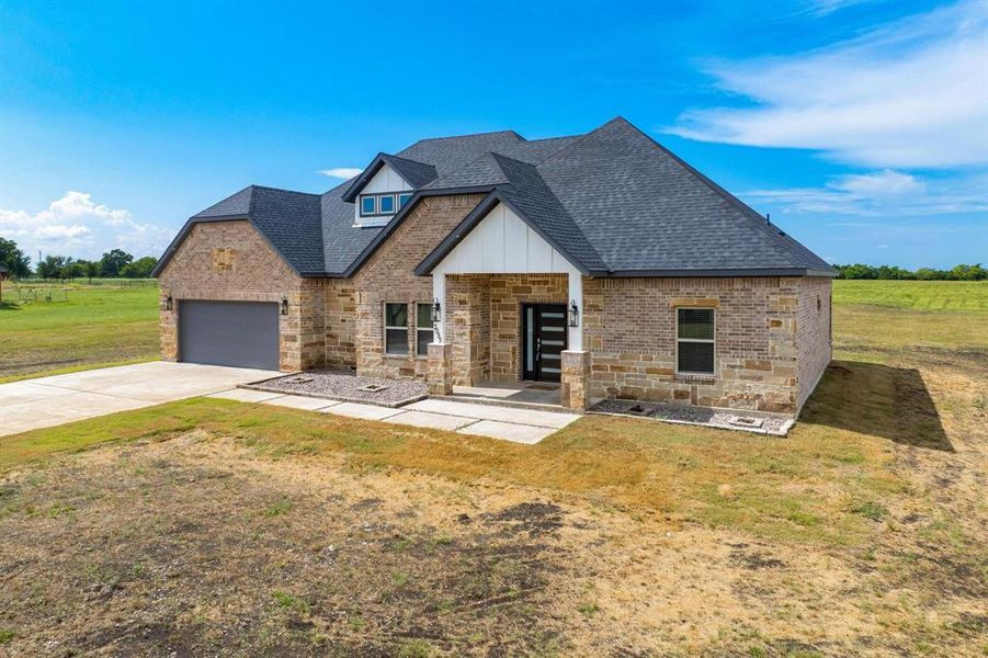Front exterior of a new home in , Greenville, TX, highlighting curb appeal (Image 20).
