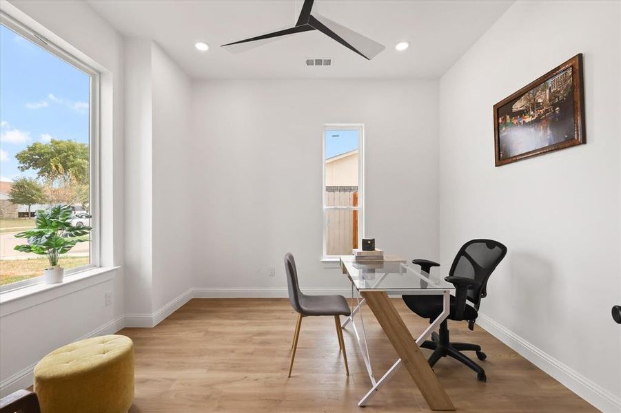 Office featuring light wood-style flooring, recessed lighting, and a ceiling fan Office featuring light wood-style flooring, recessed lighting, and a ceiling fan