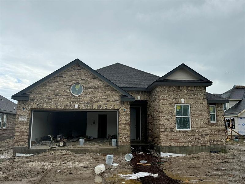 One-story home with 3 bedrooms, 2.5 baths and 3 car tandem garage