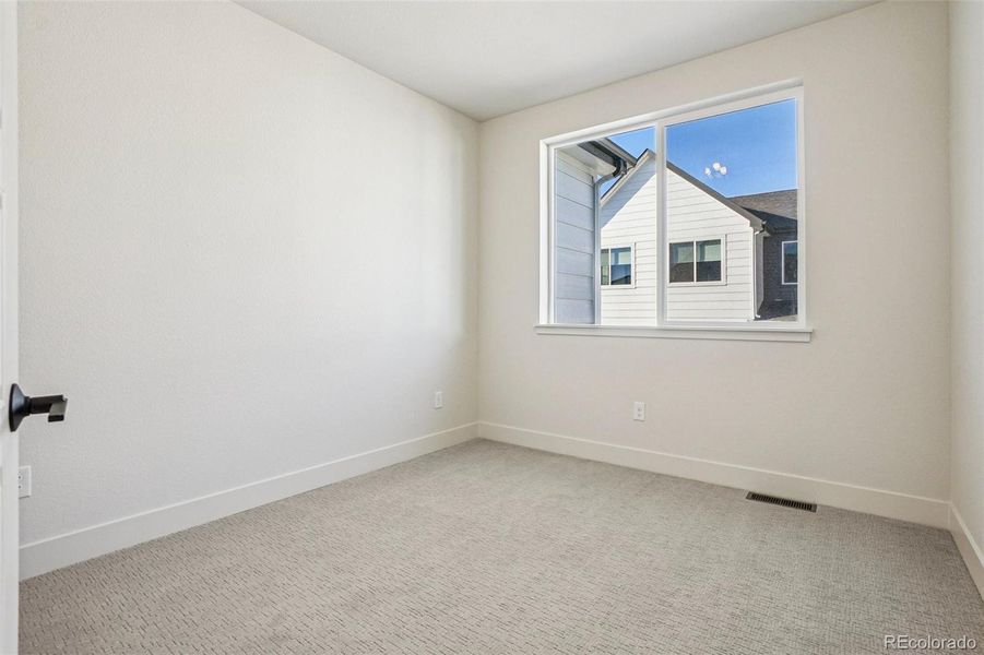 Spacious, unfurnished interior of a new home in Loretto Heights - Rise Collection, Denver (Image 19).