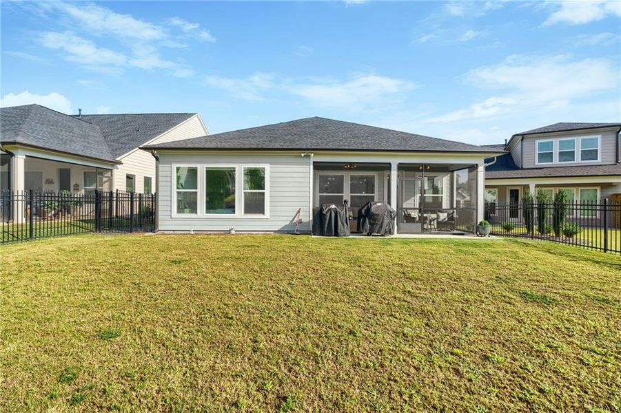 Exterior details and patio area of a home in Crescent Pointe at Great Sky, Canton (Image 30).