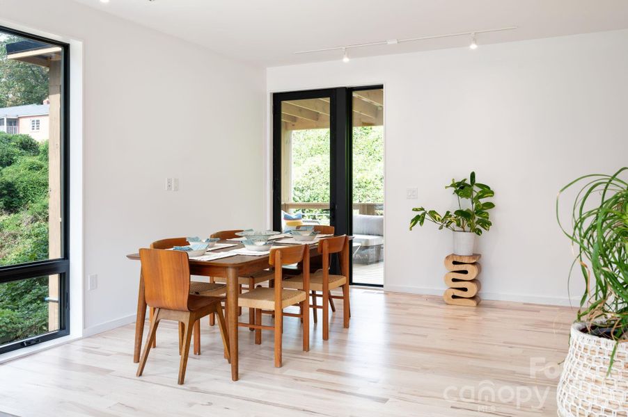 Oversized Doors Lead to Covered Deck