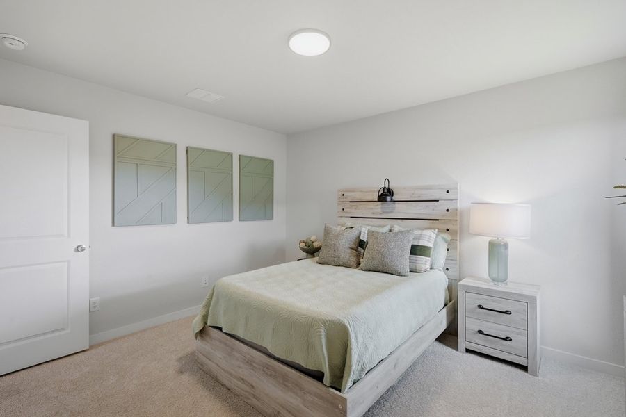 Representative furnished interior of a home built from the The Albany by Lillian Custom Homes in Tabor Ranch, Ponder (Image 33).