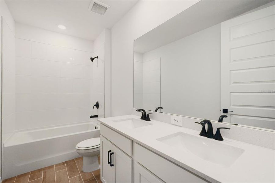 Furnished interior view inside a new home in Oakfield Trails - Signature Series, Parrish (Image 12).