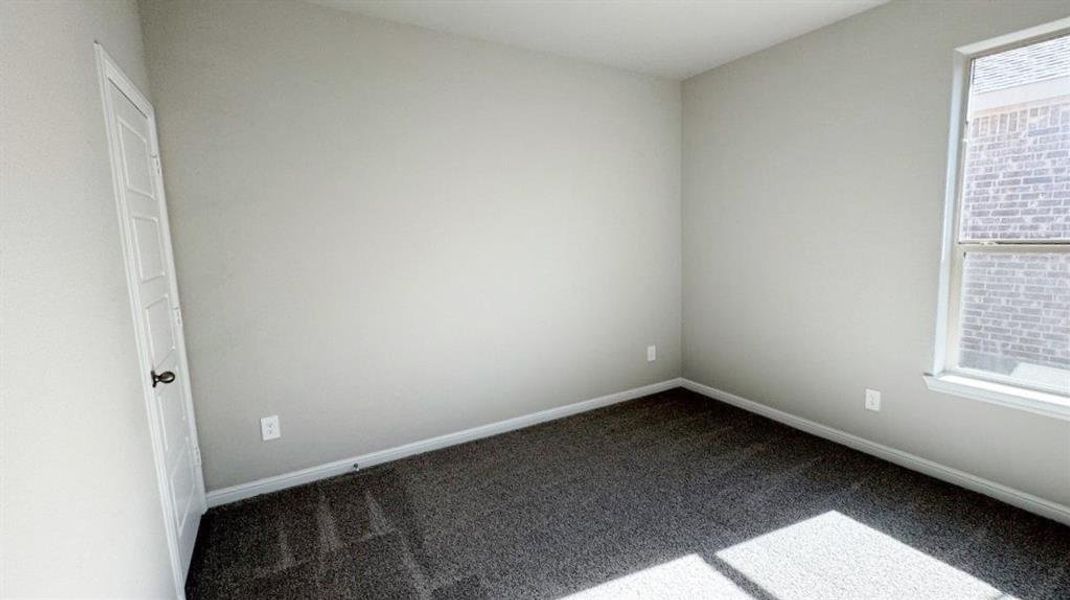 Spacious, unfurnished interior of a new home in Monarch at the Meadows, Ponder (Image 13).