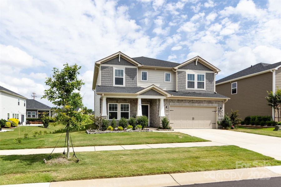 Front exterior of a new home in Simpson Farms, Monroe, NC, highlighting curb appeal (Image 24).