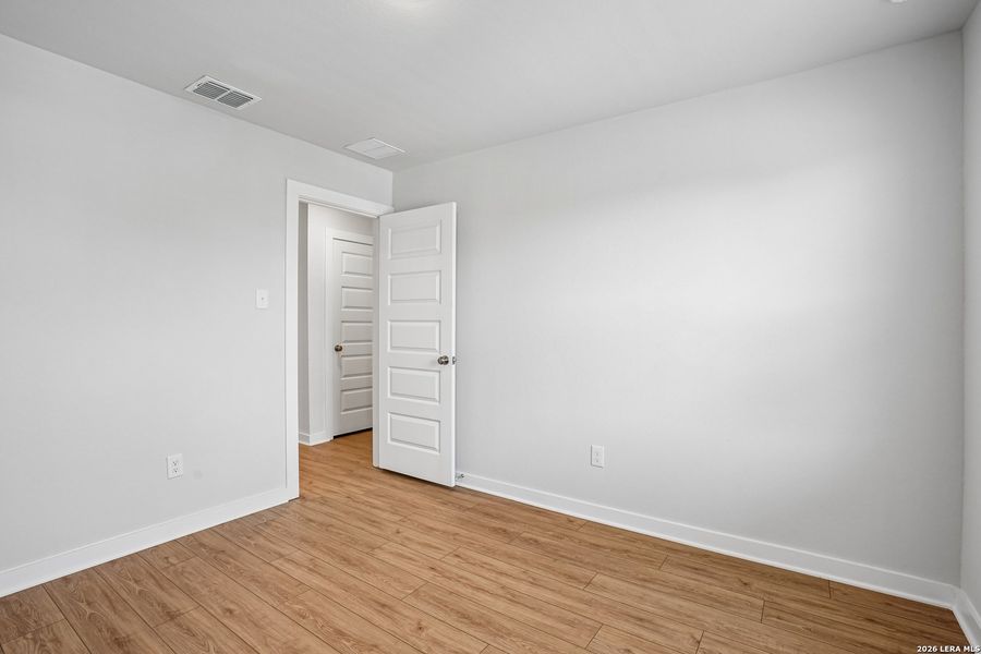 Spacious, unfurnished interior of a new home in University Village, San Antonio (Image 24).