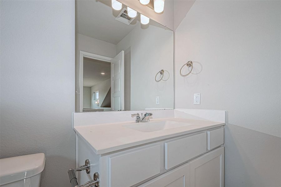 Furnished interior view inside a new home in Mill Creek Trails, Magnolia (Image 12).