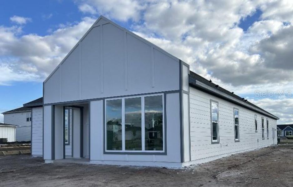 Exterior details and patio area of a home in Weslyn Park Single Family, St. Cloud (Image 3).
