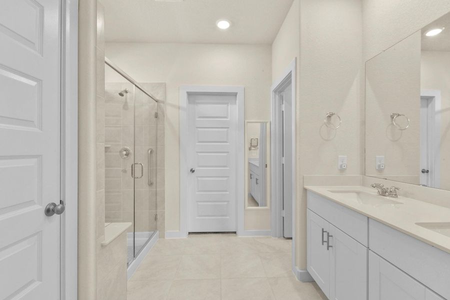 Furnished interior view inside a new home in Harper's Preserve - Traditional Series, Conroe (Image 28).