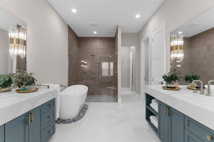 Luxurious spa-like bath with separate vanities. Luxurious spa-like bath with separate vanities.