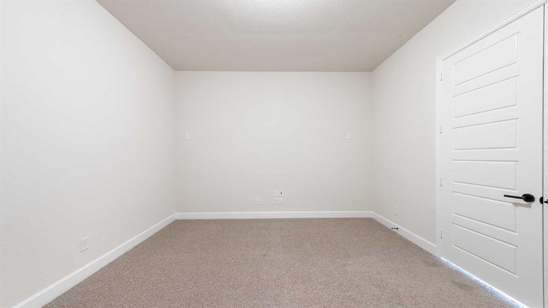 Spacious, unfurnished interior of a new home in Terraces 62', Rockwall (Image 18).