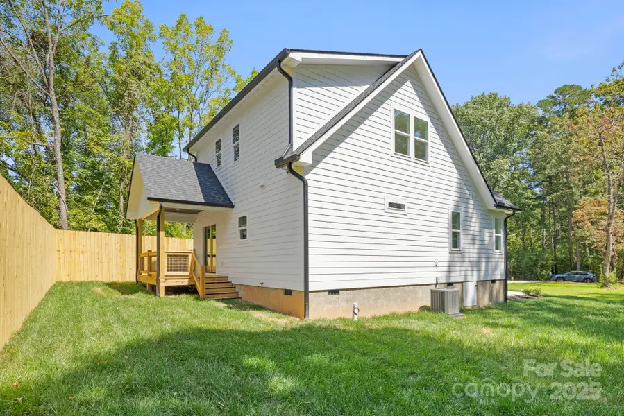 Front exterior of a new home in , Flat Rock, NC, highlighting curb appeal (Image 1).